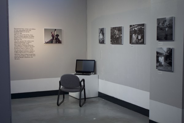 The Exquisite Lumbees and Hard Workin' Pilgrims exhibit; photos on walls.