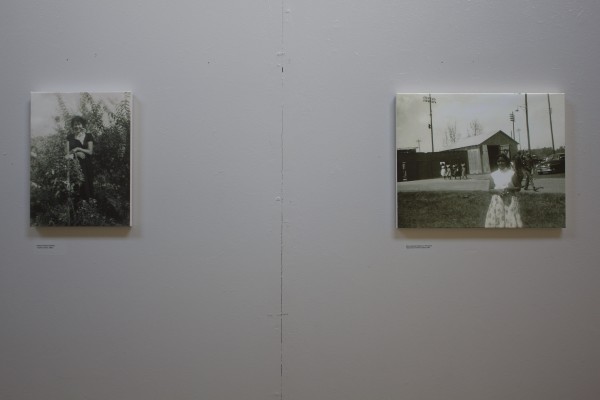 The Exquisite Lumbees and Hard Workin' Pilgrims exhibit; photos on walls.