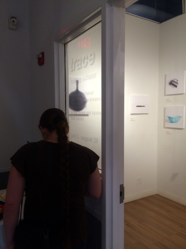 Attendees viewing the objects in the installation.