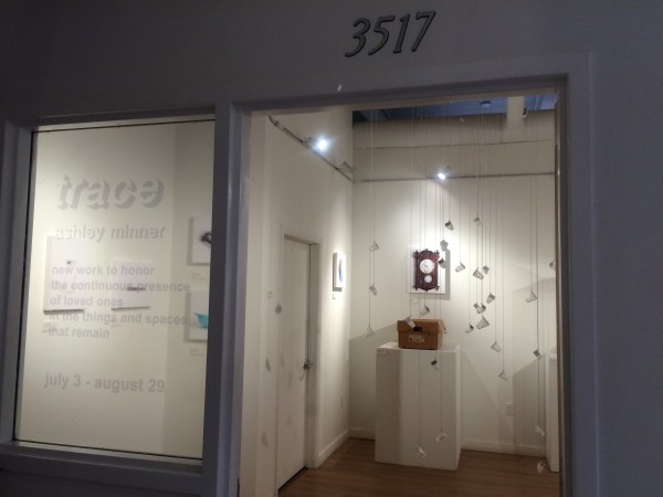 Attendees viewing the objects in the installation.