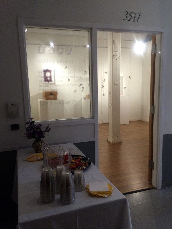 Attendees viewing the objects in the installation.