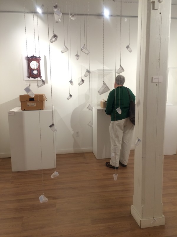 Attendees viewing the objects in the installation.