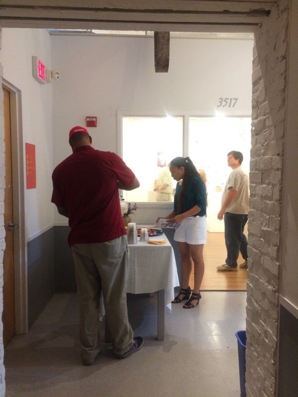 Attendees viewing the objects in the installation.