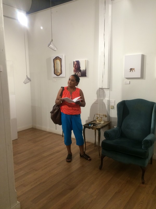 Attendees viewing the objects in the installation.