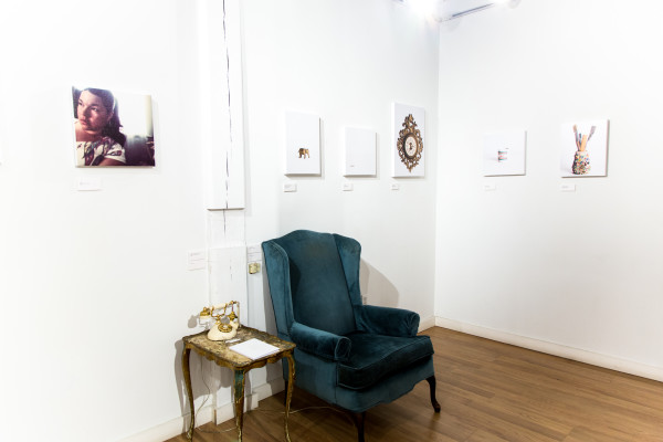 An empty antique armchair inside the installation room.