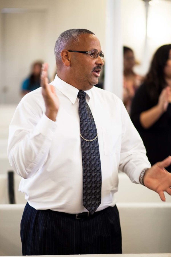 A performer clapping.