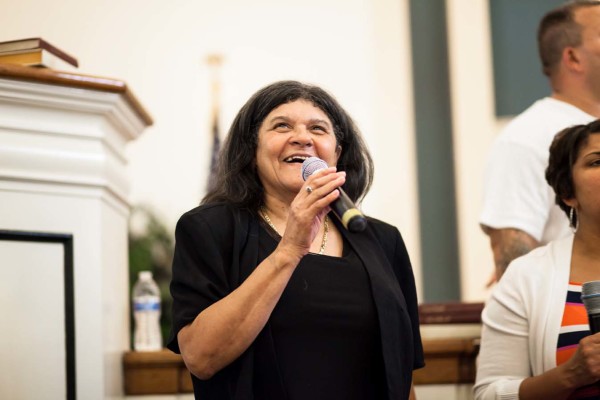 A performer at the event holding a microphone.