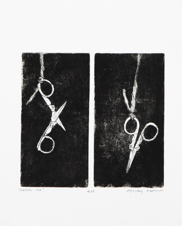 Black and white ink prints of scissors.