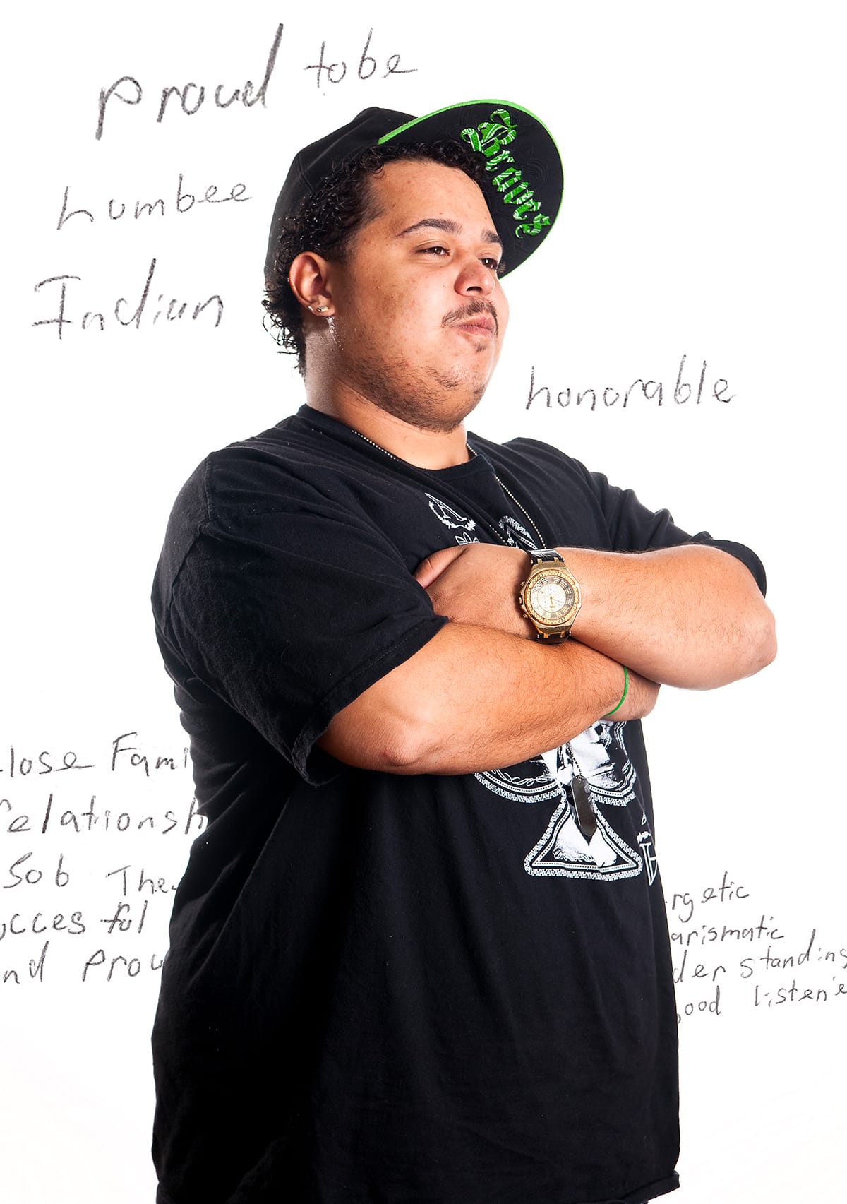 Photo of CJ. Text reads, Proud to be Lumbee Indian.