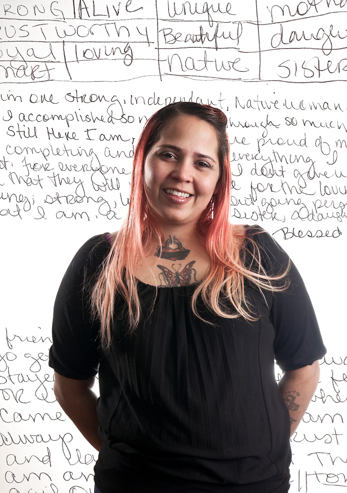 Photo of Tonya. A long paragraph of text is behind her, including the words Strong, alive, unique.